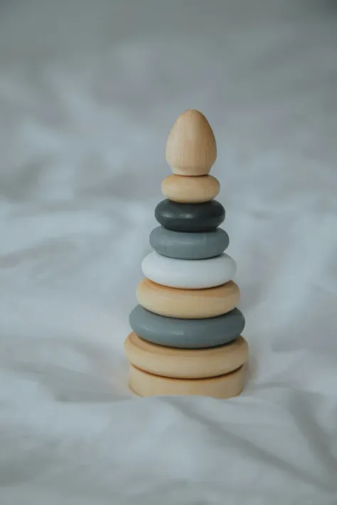Photo of a similar item: Pearhead Wooden Rainbow Stacking Rings