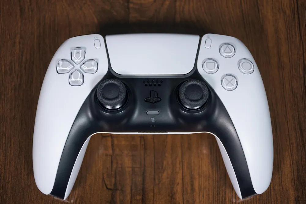 Photo of a similar item: PlayStation DualSense Wireless Controller + USB Cable, Midnight Black