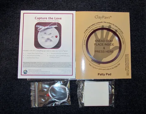 Photo of a similar item: Pearhead Pet Paw Print Memorial Frame with Clay Imprint Kit, White