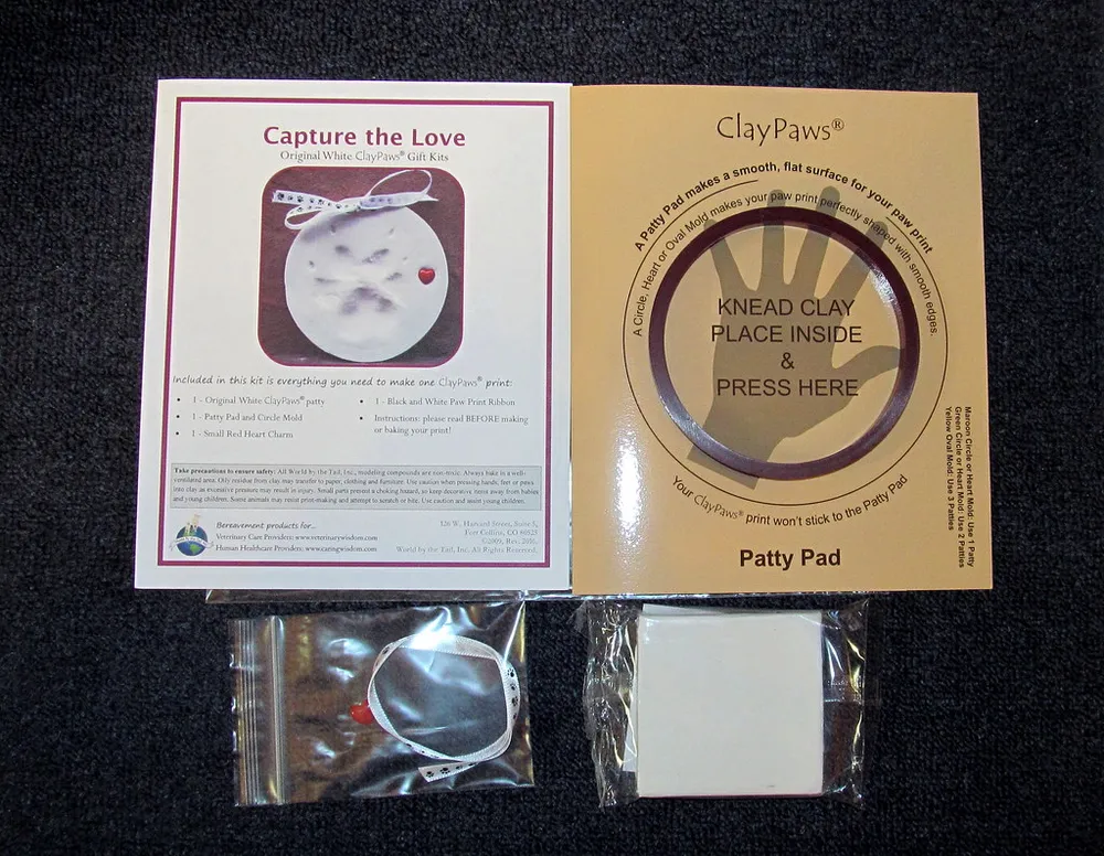 Photo of a similar item: Pearhead Pet Paw Print Memorial Frame with Clay Imprint Kit, White