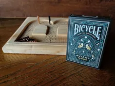 Photo of a similar item: Regal Games Cribbage Set with Folding Wooden Board
