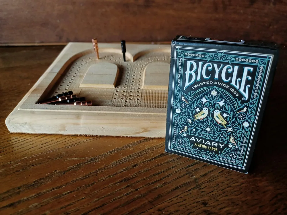 Photo of a similar item: Regal Games Cribbage Set with Folding Wooden Board