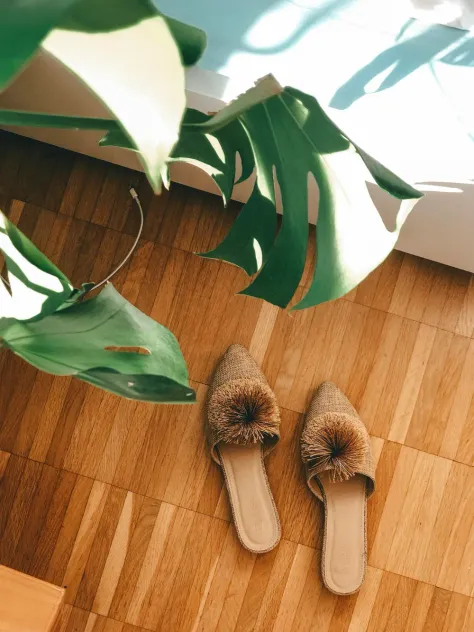 Photo of a similar item: Snug Leaves Fuzzy Scuff Slippers, Cream White