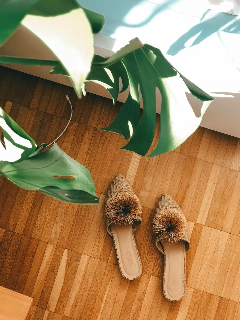 Photo of a similar item: Snug Leaves Fuzzy Scuff Slippers, Cream White
