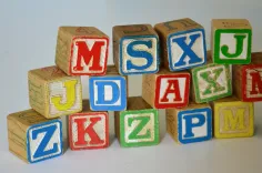 Photo of a similar item: Melissa & Doug Deluxe Wooden ABC/123 Blocks, 50 Pieces