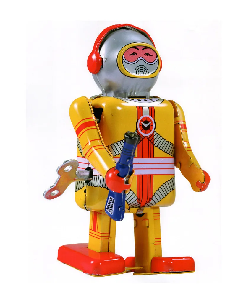 Photo of a similar item: Toyvian Vintage Tin Wind-Up Walking Robot