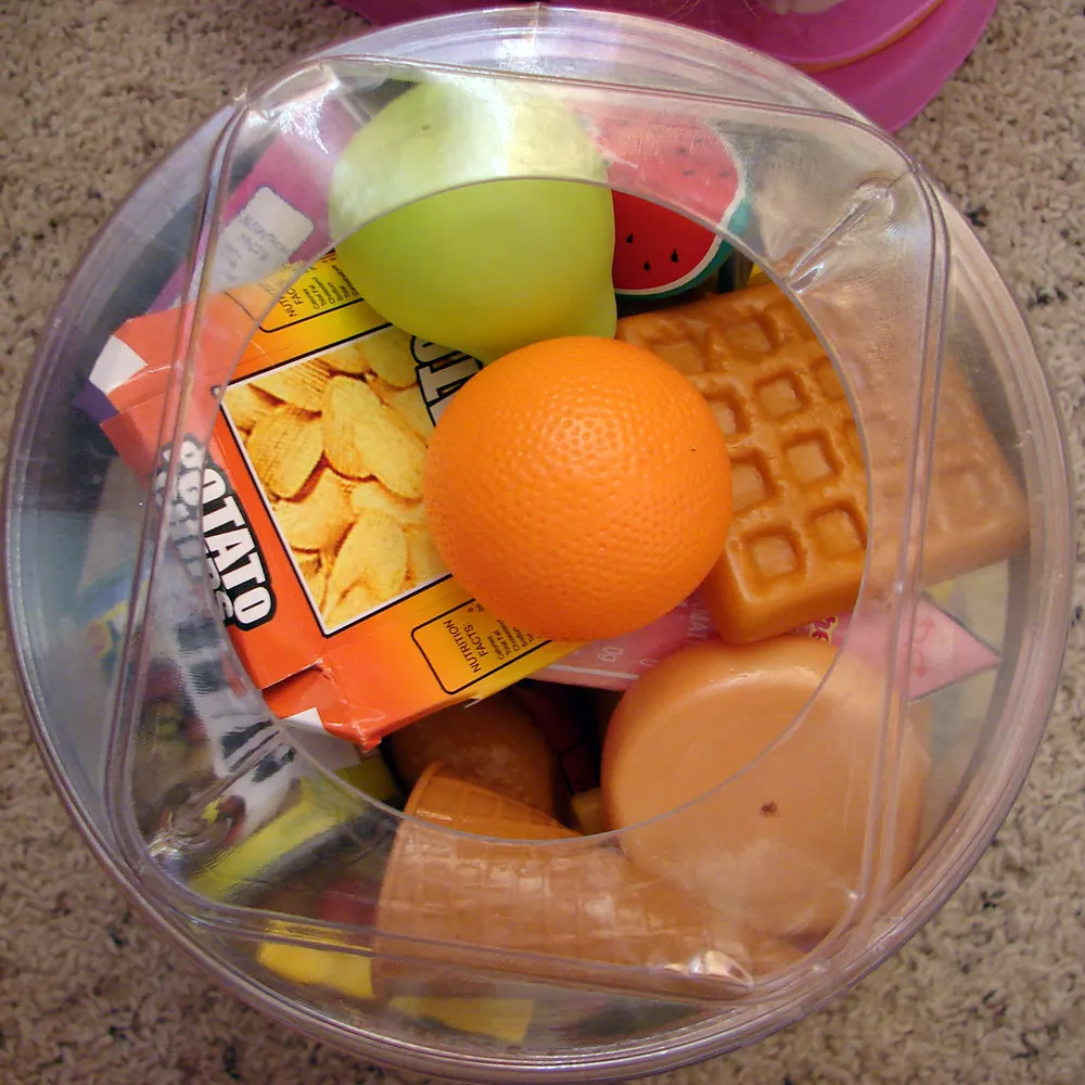 Photo of a similar item: Melissa & Doug Cutting Food Play Set
