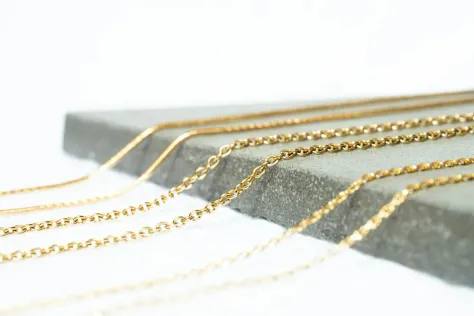 Photo of a similar item: PAVOI Dainty Layering Chain Necklace, 14K Gold Plated