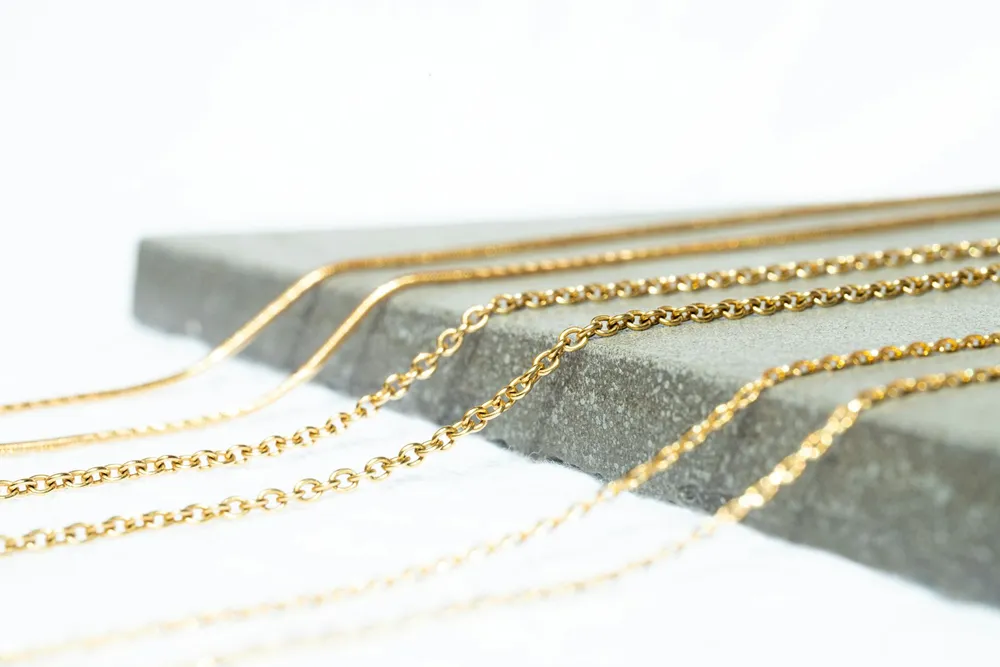 Photo of a similar item: PAVOI Dainty Layering Chain Necklace, 14K Gold Plated