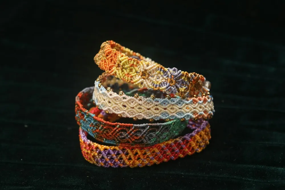 Photo of a similar item: LanMa Woven Friendship Bracelets, 12-Pack