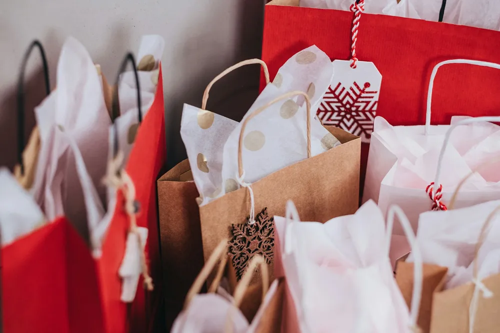 Photo of a similar item: SUNCOLOR Christmas Gift Bags with Tissue Paper, 24 Pack