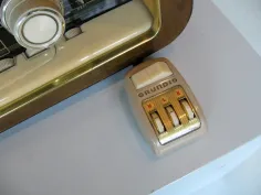 Photo of a similar item: FINTIE Remote Control Holder, 6 Compartments