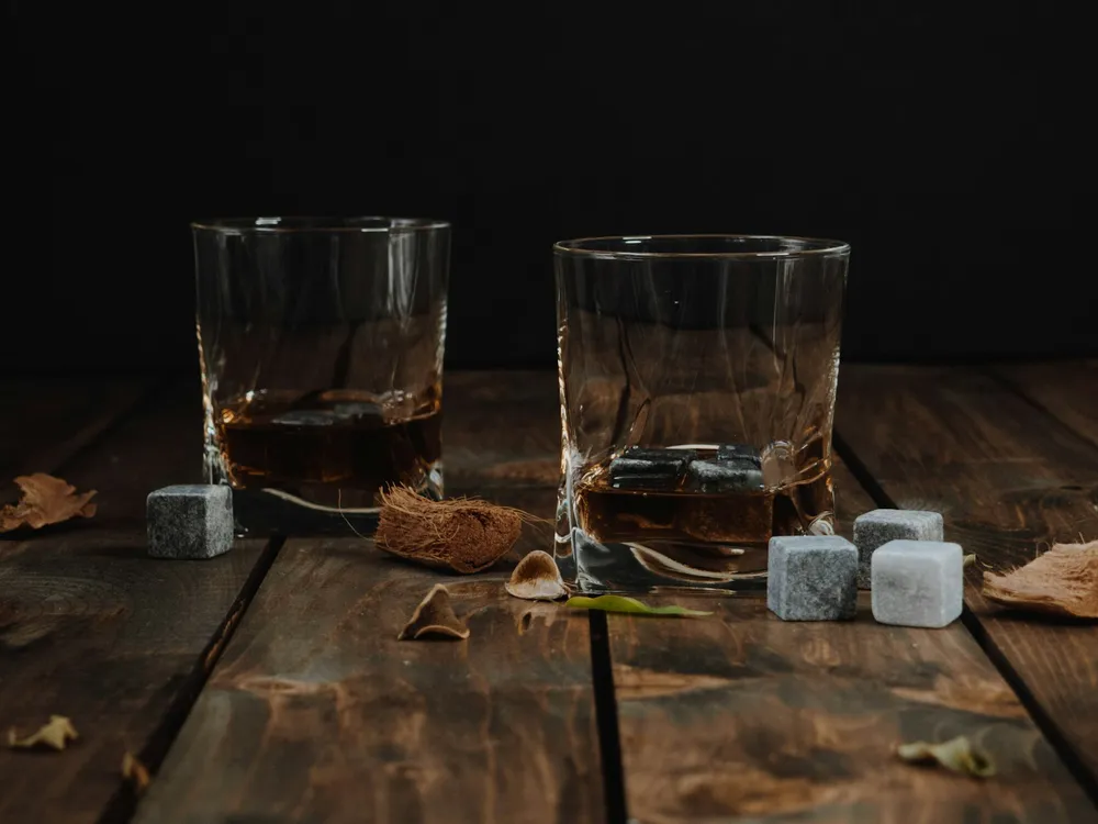 Photo of a similar item: Royal Reserve Whiskey Stones, 8 Granite Stones with Tray
