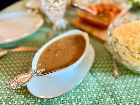 Photo of a similar item: Qlans Ceramic Gravy Boat with Saucer and Ladle, 17 oz