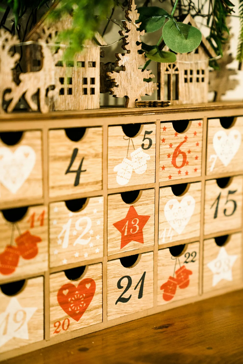 Photo of a similar item: Sunlit Unfinished Wooden Advent Calendar House, 24 Drawers